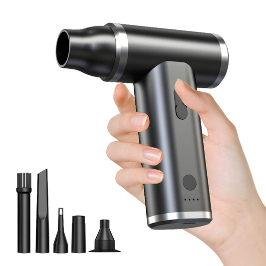 Handheld vacuum cleaner with attachments held by a hand on a white background
