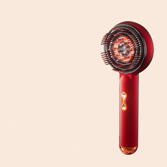Red hairbrush with orange light on a beige background