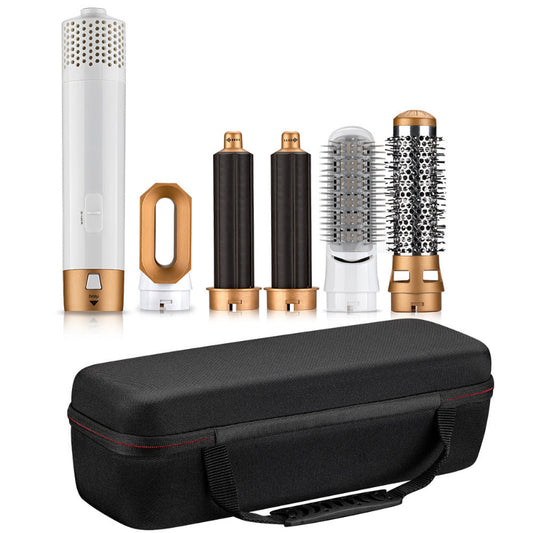 Set of hair styling tools with attachments and a carrying case on a white background